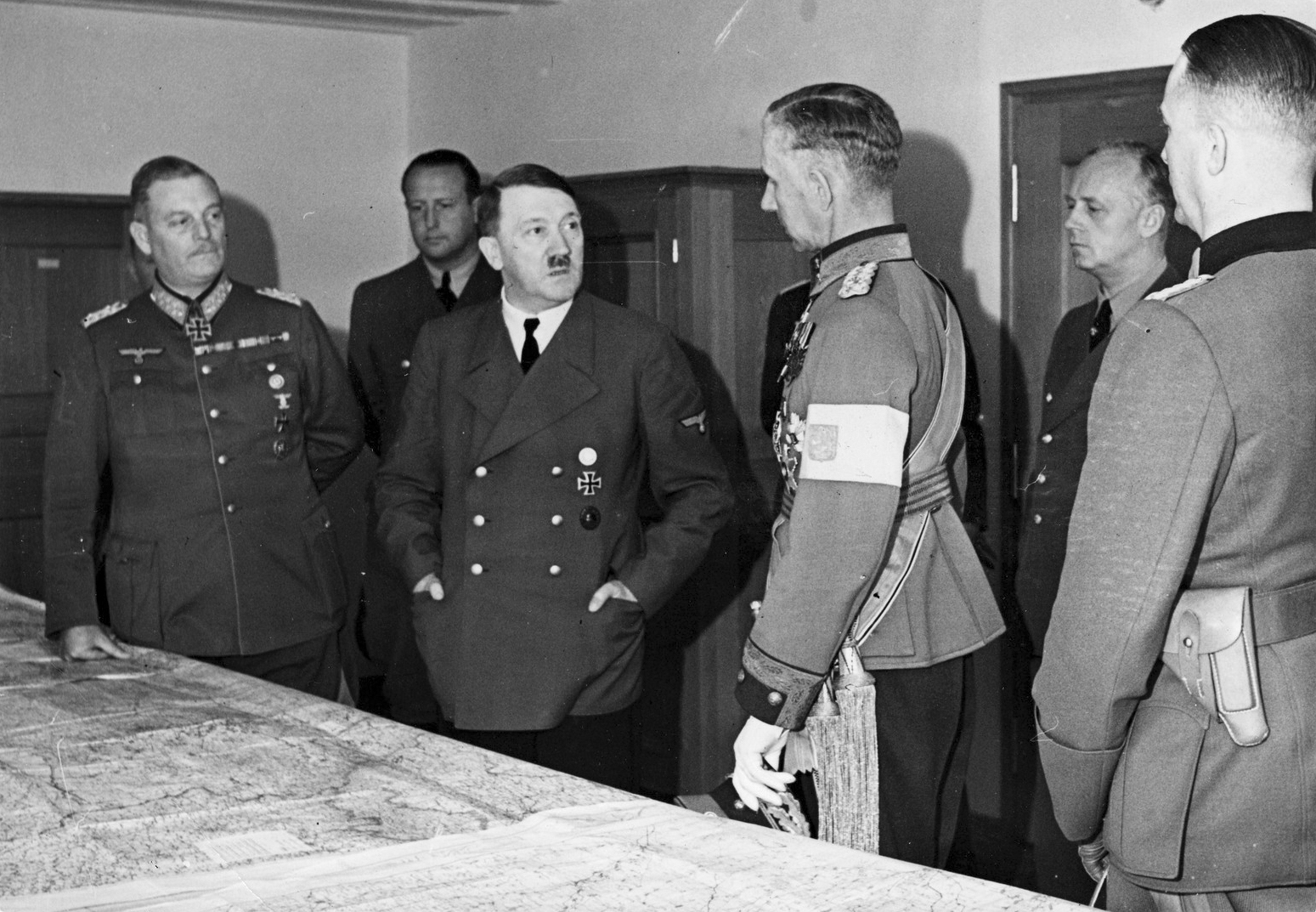 Adolf Hitler at a situation conference with general Wilhelm Keitel, lieutenant general of the Finnish army Harald Öhquist, Joachim von Ribbentrop and general Gerhard Matzky in FHQ Wolfsschanze